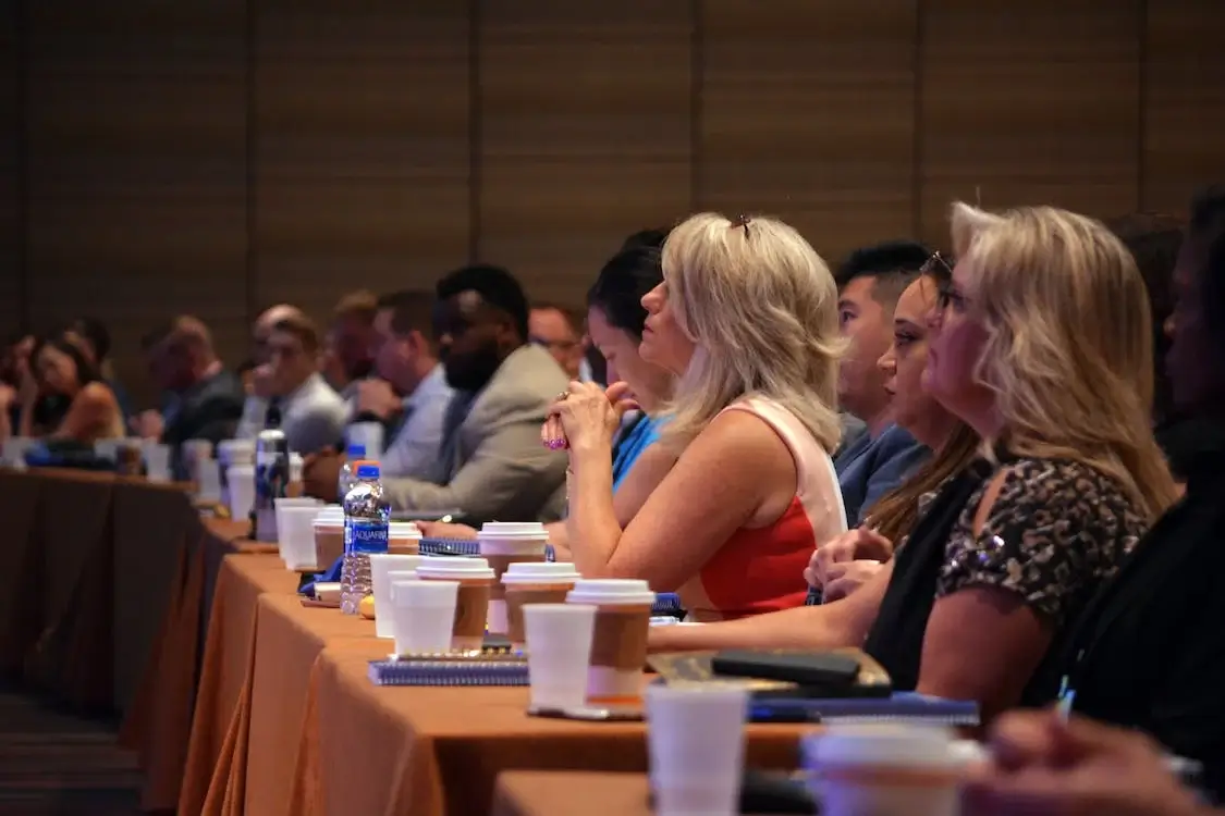 business travelers in hotel conference room